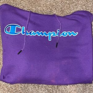 Champion, Size:M Medium Long sleeved purple hoodie. With hoodie strings,